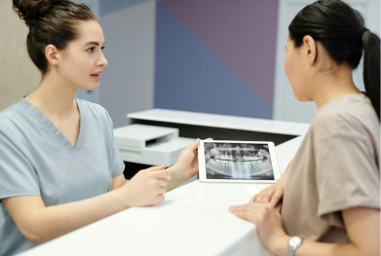 Dentist reviewing treatment options with a patient